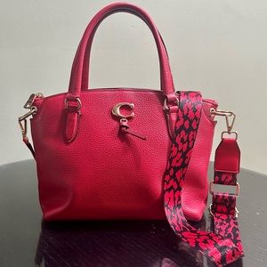 Coach Remi Satchel Red Pebble
Leather gold hardware NWOT